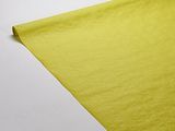 a close up of a piece of yellow fabric on a white surface