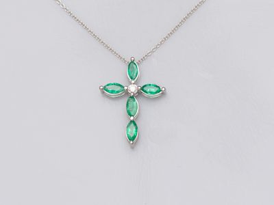 Croix en or gris 750°/°° (18K), sertie d'émeraudes taille na… - Photo 1