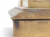 a close up of a box on a white surface