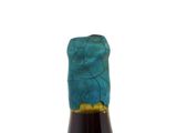 a bottle of wine that is sitting on a table