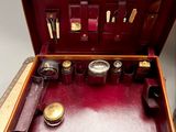 a suitcase that has a lot of items inside of it