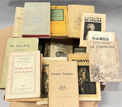 a lot of books that are sitting on a table