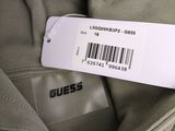 a label that says guess on the back of a jacket