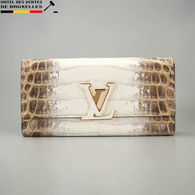 Pochette Louis Vuitton en cuir gaufré imitation crocodile