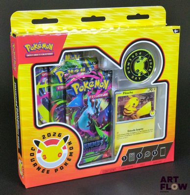une boîte de cartes Pokémon posée sur une surface noire