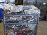 a metal cart with a bunch of shoes on top of it