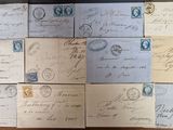 a lot of old envelopes on the table