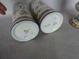 two cups sitting next to each other on a table