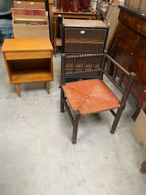 several pieces of furniture are stacked on top of each other in a room
