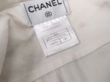 the label on a chanel jacket is clearly visible