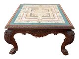 une photo d'une table basse avec un plateau en carrelage