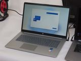 two laptops that are sitting on a table