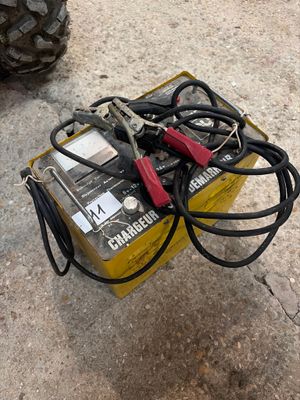 a small yellow box with a bunch of wires on it