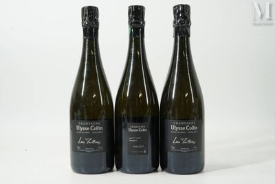 trois bouteilles de vin posées les unes à côté des autres sur une surface blanche