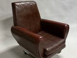 fauteuil inclinable en cuir marron avec pieds et accoudoirs chromés