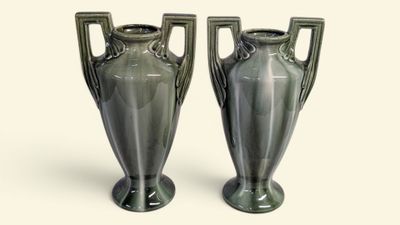 two vases that are sitting next to each other on a table