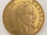 une pièce d'or représentant le profil d'un homme