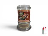 a glass jar with a label on it sitting on a table