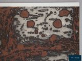 a picture of a piece of wood that has been stained
