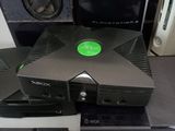 a lot of different video game consoles sitting on a table
