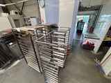several racks of food are stacked up in a warehouse