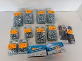 many different types of screws and nuts in the package