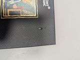 a book with a picture on it sitting on a table