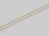 un collier en or 18 carats orné d'un pendentif en diamant