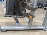 a machine that is sitting on the floor in the gym