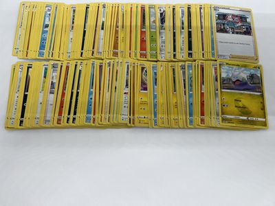 a lot of yellow cards on a white table