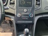 a picture of a car dashboard with a steering control