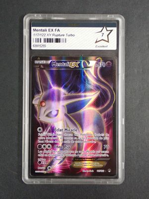 a close up of a card in a plastic holder on a table