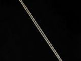 a silver necklace with a square shaped pendant on a chain
