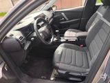 the interior of a car with two seats and a steering wheel