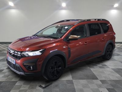 a red suv parked in a room with a checkered floor
