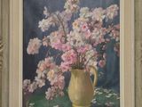 painting of pink flowers in a yellow vase on a green cloth