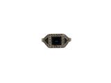 a close up of a ring on a white background