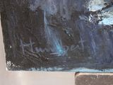 a painting of a boat in the water on a table