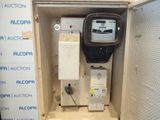 a meter that is in a box with a sign on it