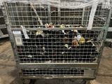 many bottles of wine in a cage on a cart