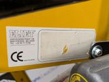 a label on the back of a machine that is sitting on a table
