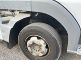 a close up of a flat tire on a truck