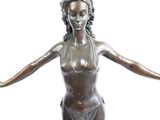 bronze statue of a woman in a bathing suit holding her arms out