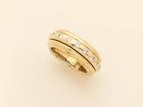 an 18k gold and diamond ring