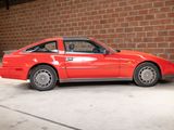 an image of a red car parked in a garage