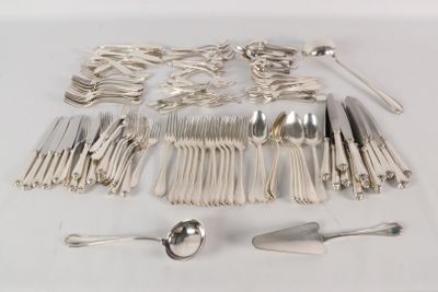 a lot of silverware on a table with spoons and spoons