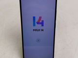 a close up of the front of a black smartphone with the 4g logo on it