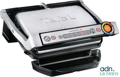 a close up of a tefal grill on a white background