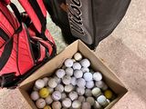 a box full of golf balls next to a bag of golf balls