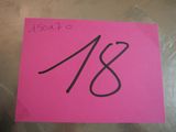 a pink post it note with the number 18 on it